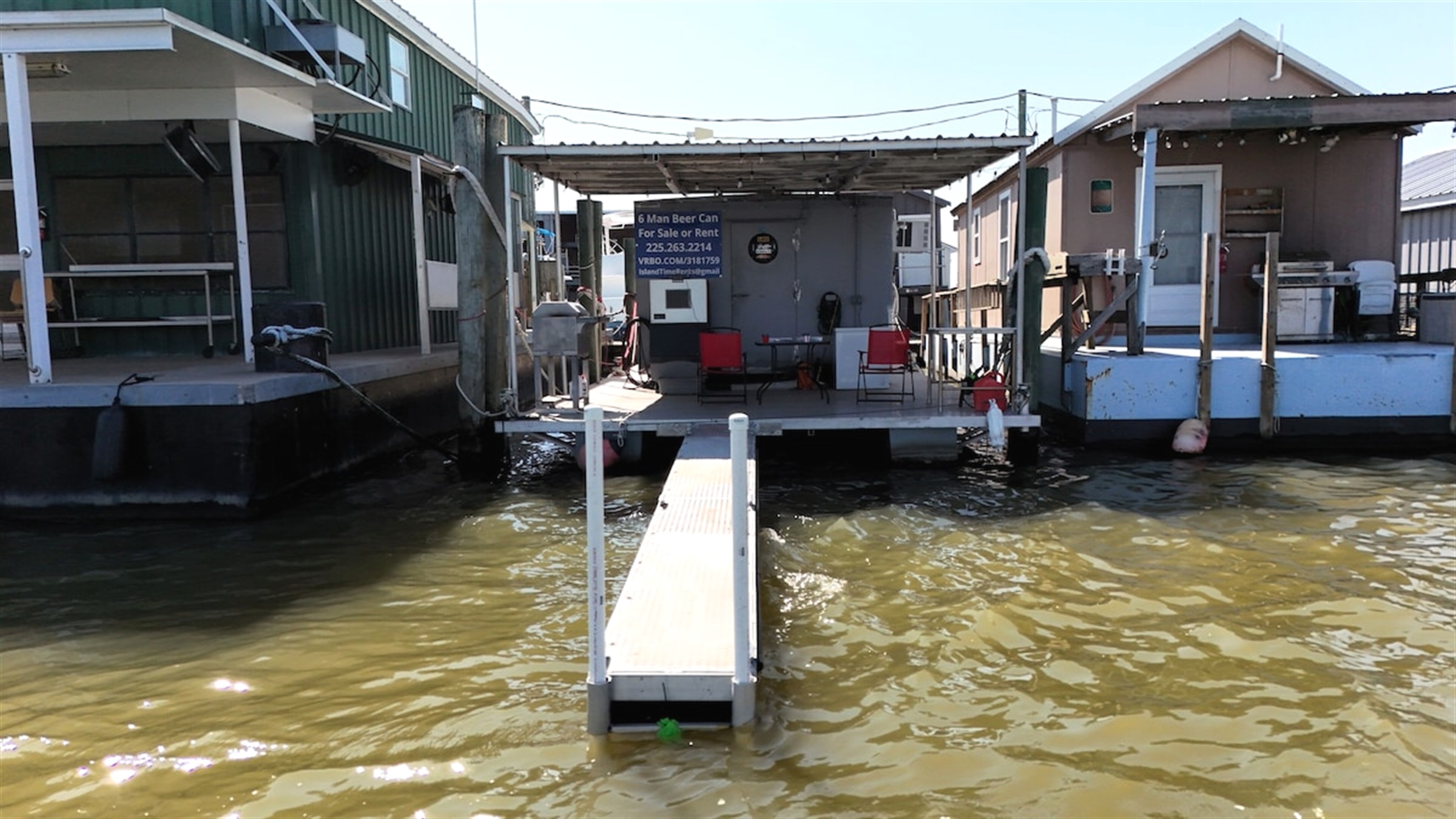 Front dock and covered deck at The 6 Man Beer Can